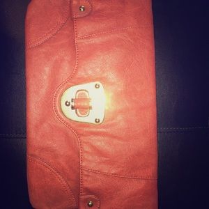 Burnt Orange Clutch with gold hardware..